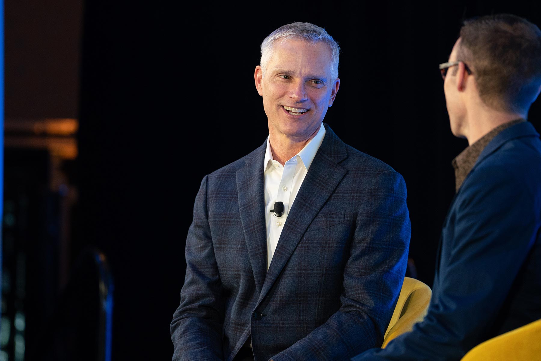 American Airlines CEO Robert Isom speaking on stage at Skift Aviation Forum in Fort Worth, TX, November 2023. 